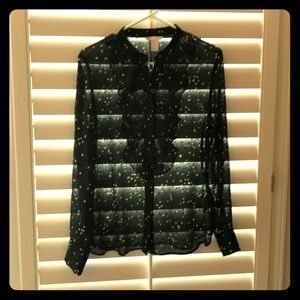 Dark green with white/yellow dots. Ruffle front.